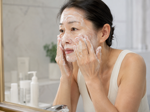 A women over-cleansing her face